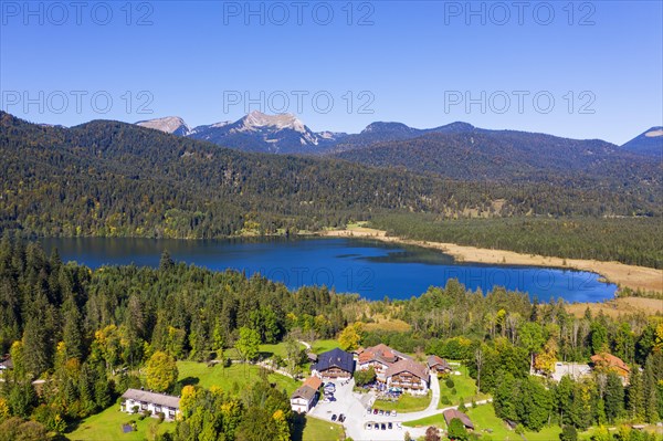 Lake Barmsee with alpine inn near Kruen