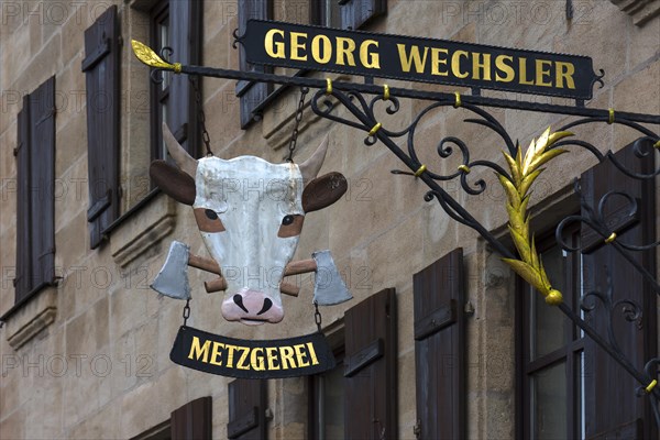 Nose shield with a cow head of a butcher's shop