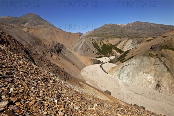 View into a Liparit landscape with barren mountains and river valley