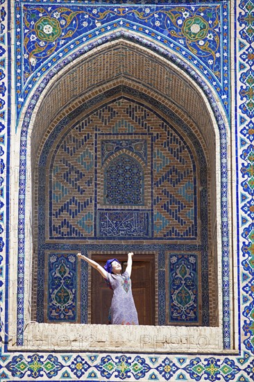 Uzbek in a pointed arch niche of the Ulug'Bek Medrese