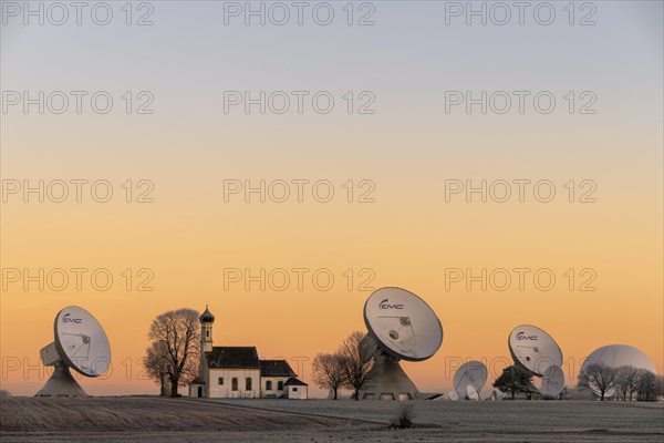 Chapel St. Johann with parabolic antenna at blue hour