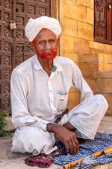 Portrait of a man with henna colored beard