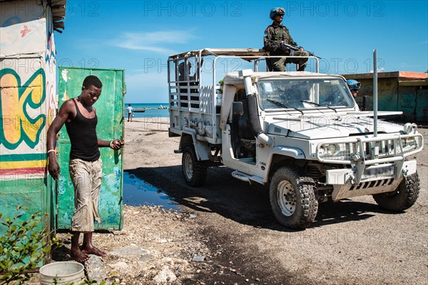 UN blue helmets in jeep on patrol