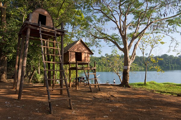 Stake houses of the indigenous Kroeung Tola people at the crater lake Yeak Laom