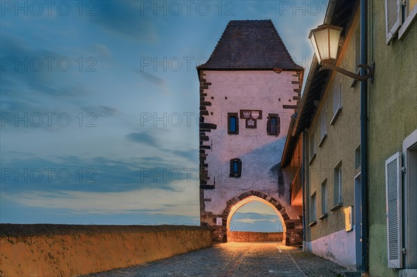 Hagenbachturm illuminated at dusk