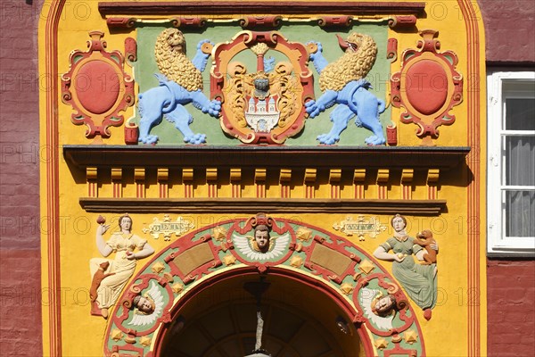 Coats of arms and figures