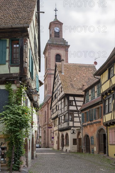 Historic houses in alley with church