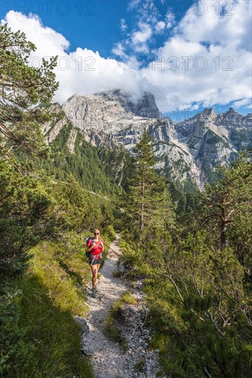 Hiker on a hiking trail to the Rifugio San Marco