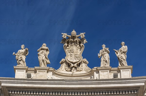 Alexander VII Coat of Arms and statues of saints Mark the Evangelist