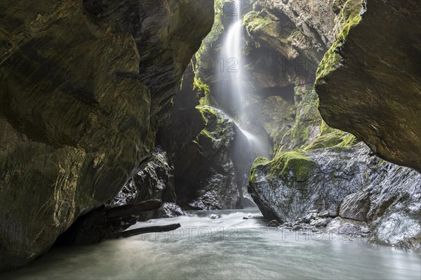 Narrow gorge with waterfall