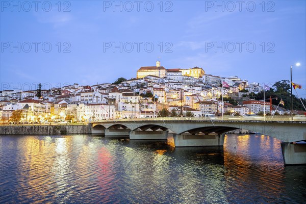 Cityscape with university at top of the hill in the evening