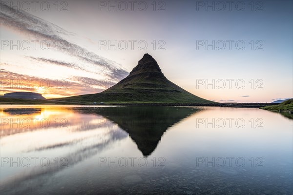 Mountain Kirkjufell reflected in the water