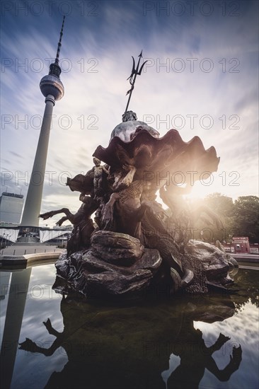 Berlin Television Tower at Neptune Fountain Alexanderplatz