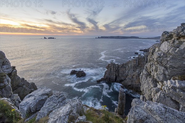 Rocky coast in the evening light at Pointe de Penhir