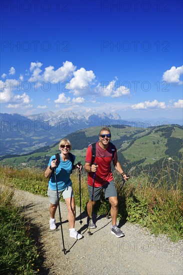 Hikers on the summit panorama trail of the Hohe Salve