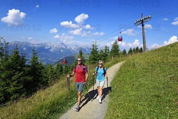 Hikers on the summit panorama trail of the Hohe Salve