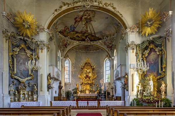 Interior with main altar and side altars