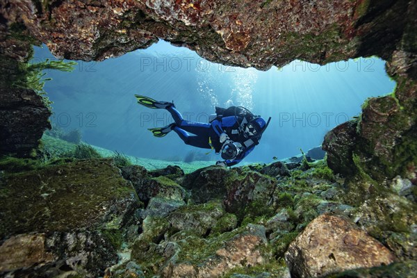 Diver with underwater camera
