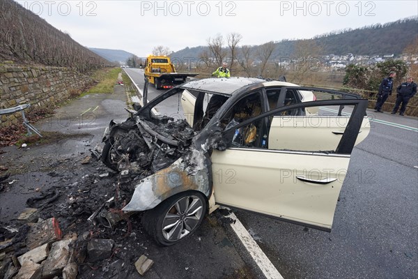 Traffic accident on the Bundesstrasse 49 with burnt out car