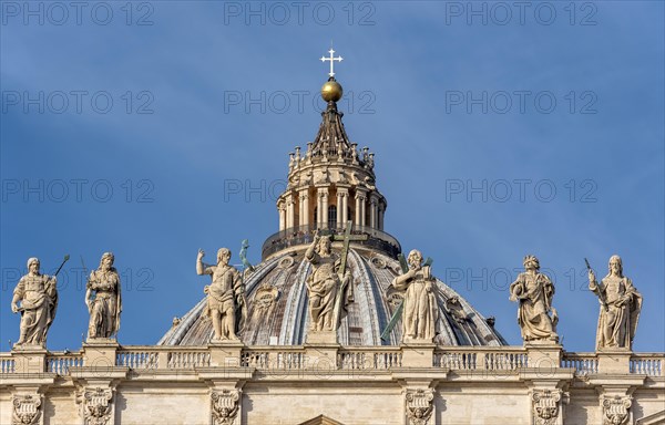 Dome of St. Peter's Basilica with statues of Saints Thomas