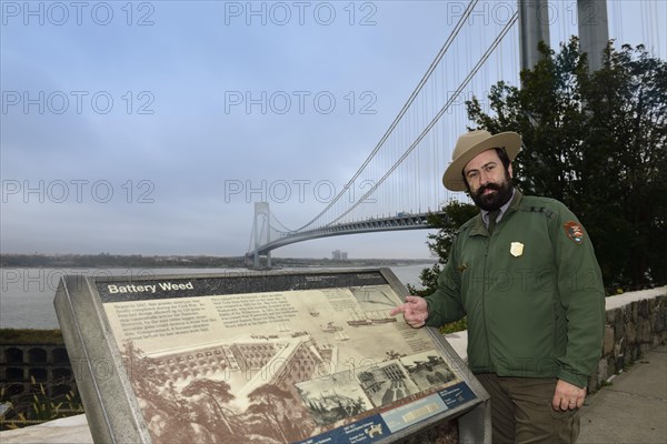 Park ranger in Fort Wadsworth explains the Verrazzano-Narrows-Bridge