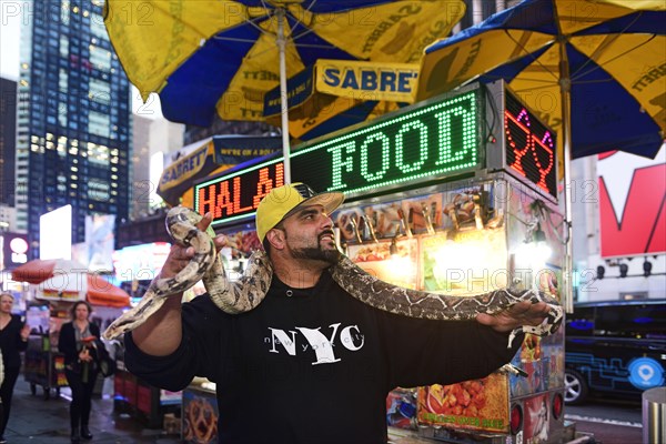 New Yorker gets photographed with Python