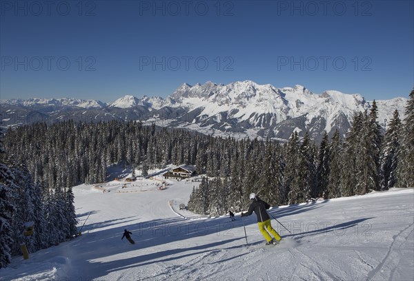 Ski area Planai with fairytale meadow hut and view to the Dachstein massif