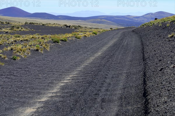 Track through volcanic lunar landscape
