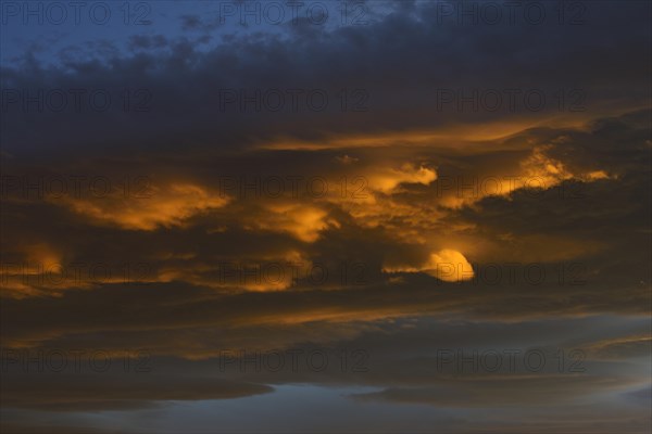 Burning clouds at sunset