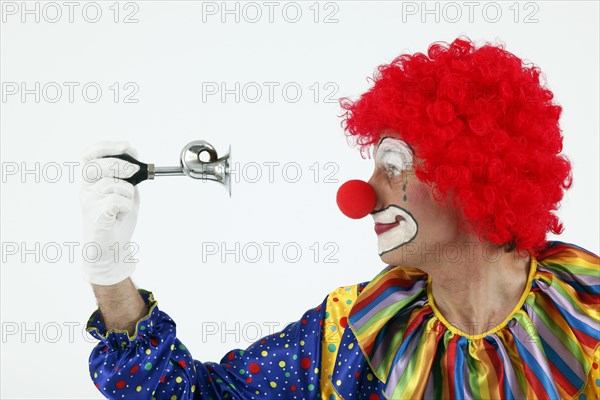 Clown honks his horn