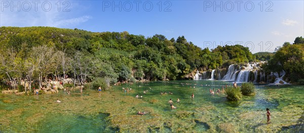 Tourists bathing at the Skradinski Buk waterfall