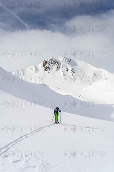 Ski tourers in the snow