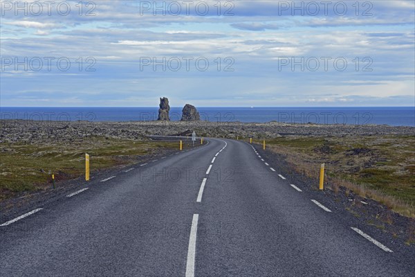 Country road leads to two bizarre rocky needles