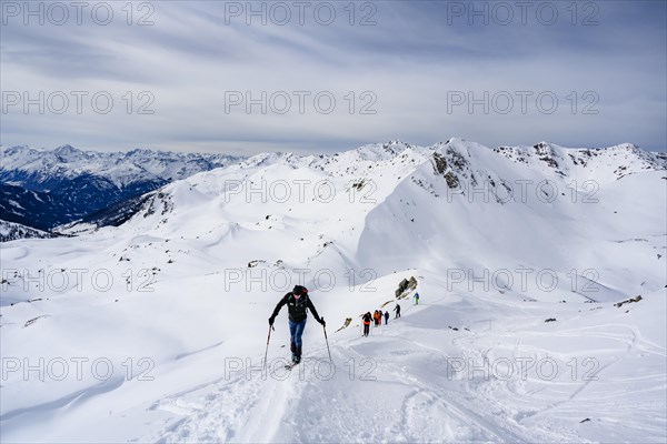 Ski tourers in the snow