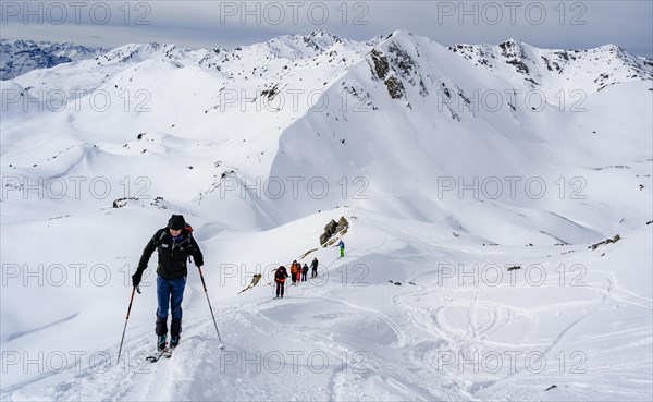 Ski tourers in the snow