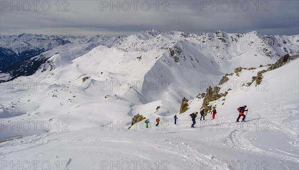 Ski tourers in the snow