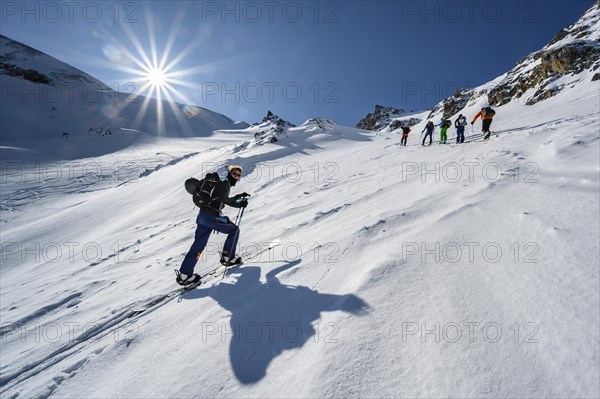 Ski tourers in steep terrain