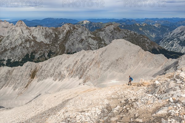 Hiker on hiking trail to the Birkkarspitze