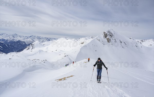 Ski tourers in the snow