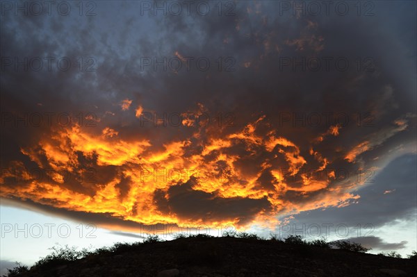 Burning clouds at sunset