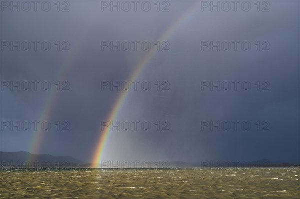 Rainbow during a hurricane over Lake Constance