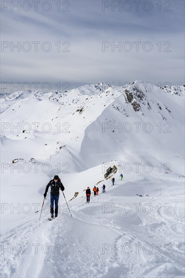 Ski tourers in the snow