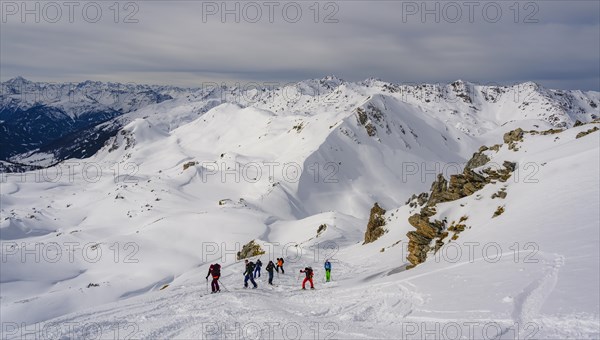 Ski tourers in the snow