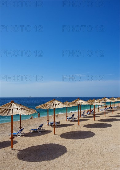 Beach with sunshades