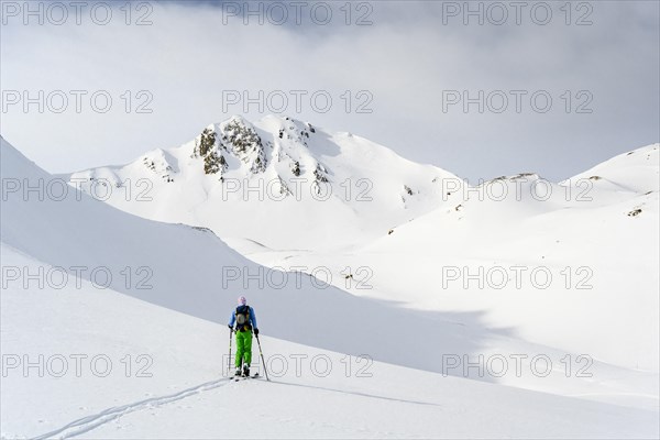 Ski tourers in the snow