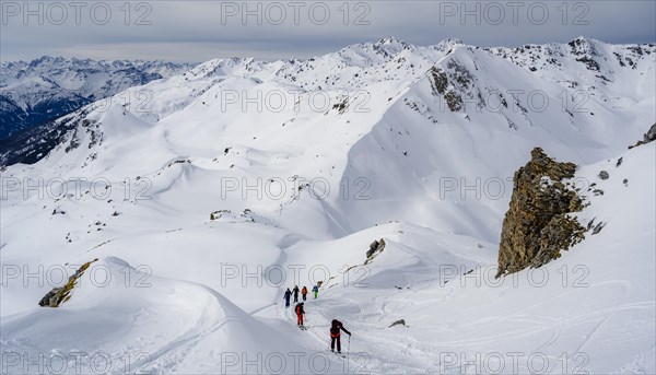 Ski tourers in the snow