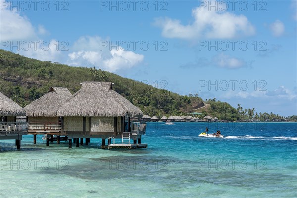 Overwater bungalows in the lagoon