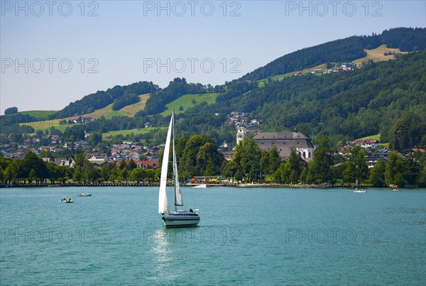 Lakeside promenade with view of the Basilica of St. Michael