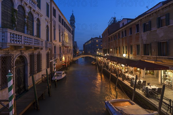 Evening atmosphere with restaurant on the canal