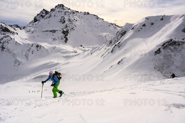 Ski tourers in the snow